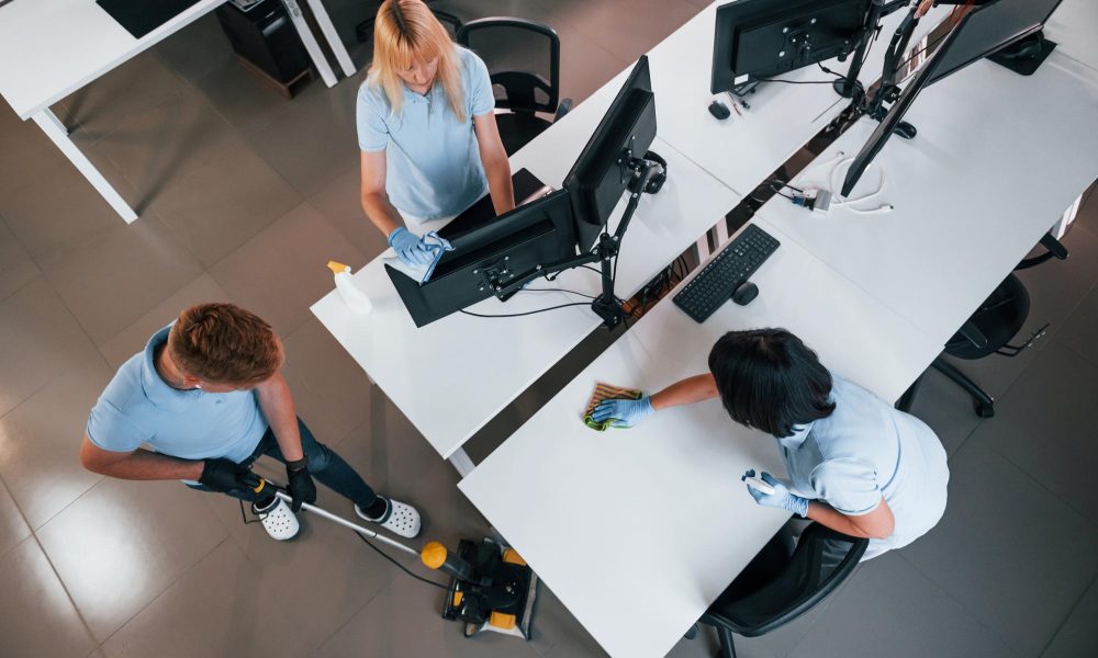 top-view-group-workers-clean-modern-office-together-daytime